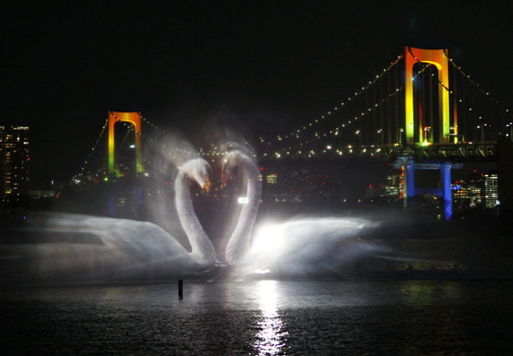 Tokyo, Japan: An image of swan is projected onto a screen created by a water fountain during a press preview of the Odaiba water illumination show Photograph: Yuriko Nakao/Reuters. Source: 24 Hours in Pictures, London Guardian, December 18, 2009. Click on the image to be taken to the gallery.